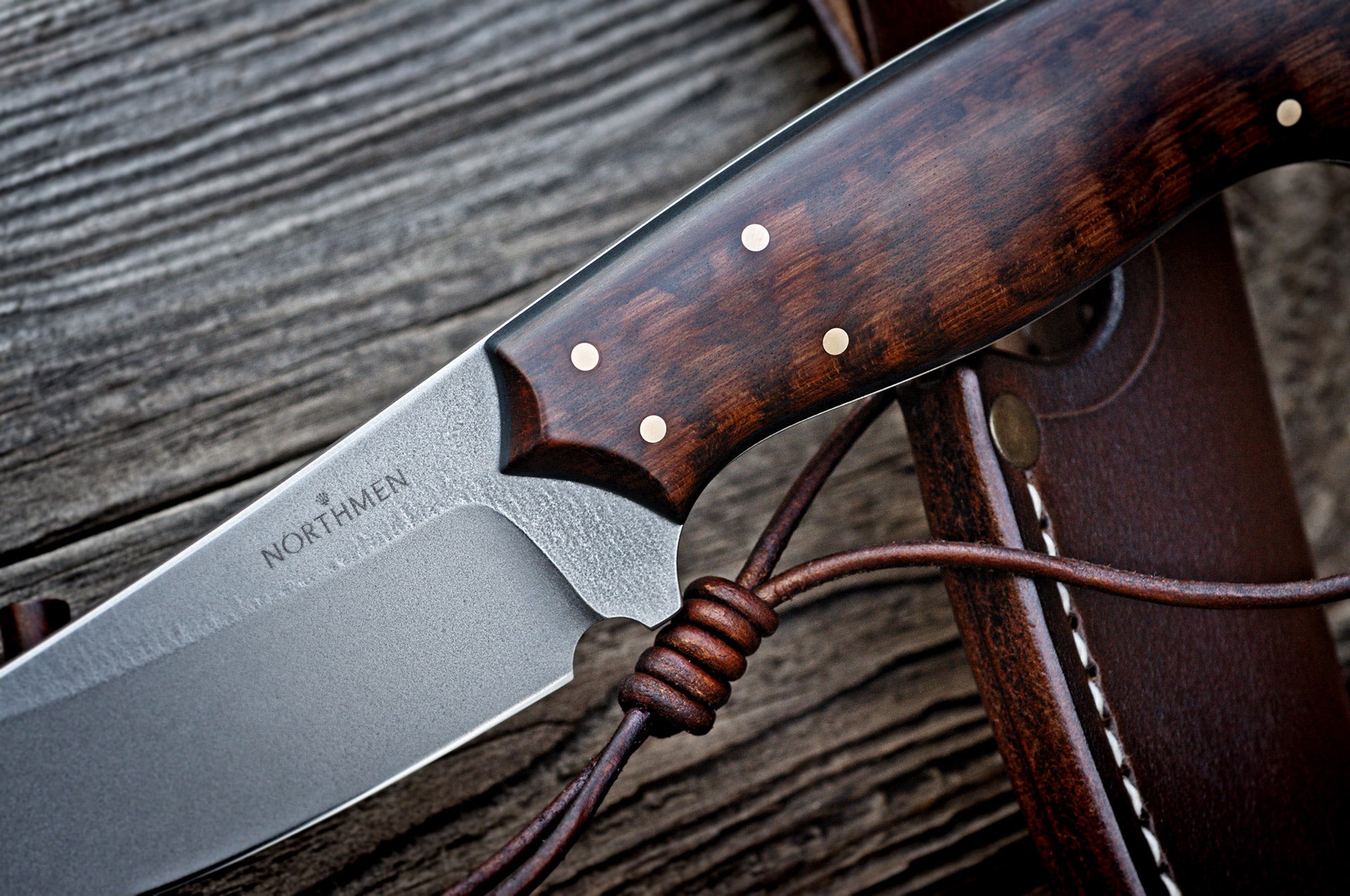 Custom made Bear's Claw shaped knife. Handforged carbon steel Damascus blade
